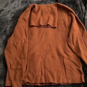 Brown free people turtleneck sweater.